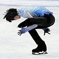 Hanyu esegue una difficile trottola alla finale del Grand Prix nel 2019.