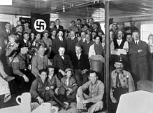 Hitler with Nazi Party members in 1930 Bundesarchiv Bild 119-0289, Munchen, Hitler bei Einweihung "Braunes Haus".jpg