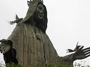 The large golden statue of the Virgin Mary on ...