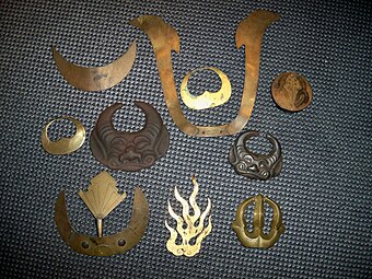 Various Japanese maedate, crests that are mounted in the front of a samurai helmet kabuto.