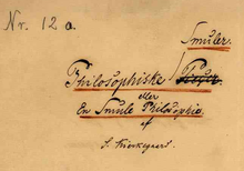Handwritten writing of the cover page of Philosophiske Smuler en Smule eller Philosophies. Nr. 12 a. is written on the top left, and Smuler was misspelled, crossed off, and corrected. It is signed S. Kierkegaard.