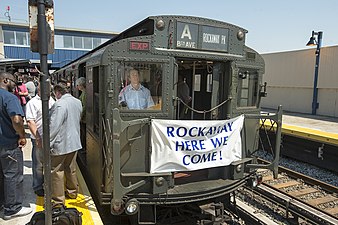 A vintage R1 subway car leading the first trip onto the Rockaway Line on May 30, 2013, after having been closed due to damage from Hurricane Sandy