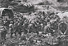 Doughboys from the 112th Field Signal Battalion, 37th Division, waiting to advance near Avocourt, France, September 26, 1918. Ohio National Guard (44853497975).jpg