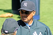 Reggie Jackson, wearing a New York Yankees baseball cap