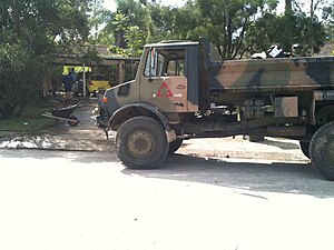 An Australian Army truck assisting with the cleanup of a flood affected suburb of Brisbane