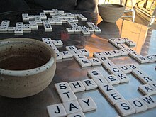 A game of Bananagrams in progress Bananagrams and tea.jpg