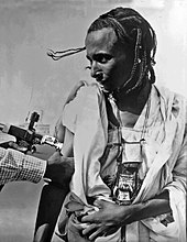 Smallpox vaccination in Niger, 1969. A decade later, this was the first infectious disease to be eradicated. Fighting smallpox in Niger, 1969.jpg