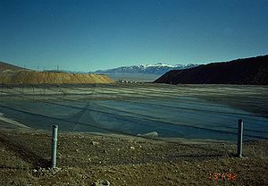 Netted solution pond next to cyanide heap leac...