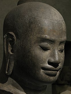 Tête présumée de Jayavarman VII, 1181-1201 ou 1218, style du Bayon (Angkor). Cambodge.