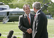 McClellan with President Bush as he announced his resignation as White House Press Secretary.