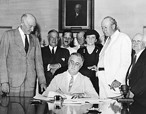 Roosevelt Signs The : President Roosevelt sign...