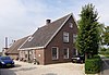 Langhuisboerderij, met laag achterhuis Vlietenburgh met invloeden van Amsterdamse school stijl