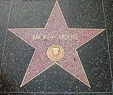 closeup of Mickey Mouse star, showing title and Motion Picture emblem