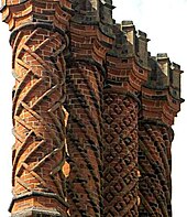 Decorative Tudor brick chimneys at Hampton Court Palace Tudor chimneys on Hampton Court Palace, Middlesex.jpg