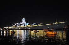 The Battleship USS New Jersey on the Camden waterfront in 2010 USS New Jersey Night.jpg