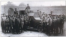 Provisional Government's volunteer soldiers secure Petrograd's Palace Square with the Austin Armoured Car, summer 1917. Bronevik i iunkera na Dvortsovoi ploshchadi 1917.jpg