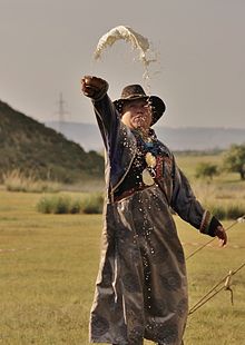 Buryat shaman performing a libation. Belikto.JPG