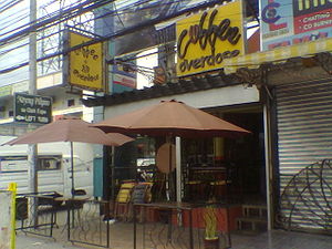 Front of coffee shop taken by mobile phone.