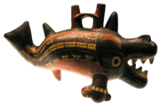 A fish-like figurative double spout and bridge vessel from Cahuachi.