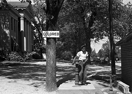 Segregated drinking fountain at Racial segregation, by John Vachon (edited by Durova)