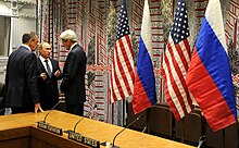 Russian (Lavrov, Putin) and US (Kerry) representatives meet, in the United Nations headquarters in New York, to discuss the situation in Syria on 29 September 2015 Sergey Lavrov, Vladimir Putin and John Kerry.jpg