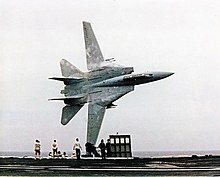 Dale "Snort" Snodgrass performing the "banana pass" stunt over the USS America in 1988 SnodgrassBananaPass.jpg