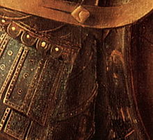 Reflet du peintre, avec son chaperon rouge, dans l'armure de Saint Georges