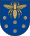 A coat of arms depicting a golden scarab with wings and legs outstretched flying over six purple flowers all on a blue background