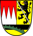 Rotbewehrter und -gezungter schwarzer Bamberger Löwe im Wappen des Landkreises Haßberge