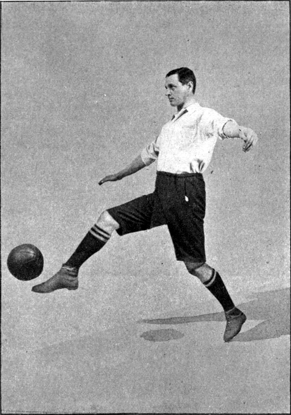 Illustration of a football player kicking a ball.