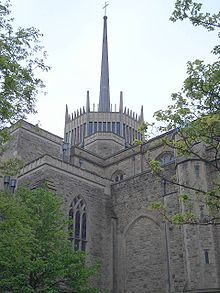 The exterior, with the rebuilt lantern tower and distinctive aluminium spire Blackburn Cathedral 2.jpg