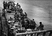 Royal Indian Naval personnel on board a landing craft during combined operations off Myebon, January 1945 Commonwealth Forces in Burma IND4428.jpg