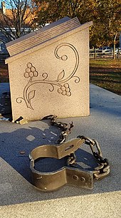 Part of the memorial for the victims of the 1692 withcraft trials, Danvers, Massachusetts Danvers victims memorial, book and chains.jpg