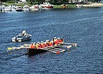 Kyrkbåt med tävlingsåror i Sulkavan suursoudut i Finland 2002.