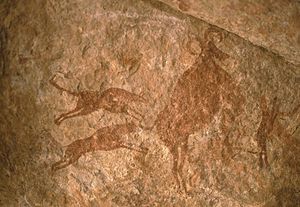 Petroglyph depicting two dogs hunting - Tassili n'Ajjer, Algeria Fondazione Passare V31 189.jpg