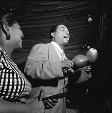 Graciela on claves and her brother Machito on maracas; Machito said that salsa was much like what he had been playing from the 1940s. Machito and his sister Graciella Grillo.jpg
