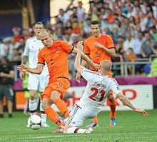 Dutch star football players Arjen Robben and Robin van Persie during a game with the Netherlands against Denmark at Euro 2012 NED-DEN Euro 2012 (10).jpg