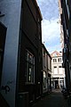 View from the Schoutensteeg, a side alley looking West towards the Barteljorisstraat