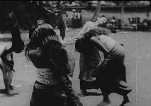 Film still showing women dancers bending and writhing