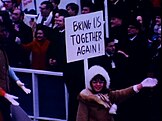 Vicki Lynne Cole with a recreation of the sign in 1969