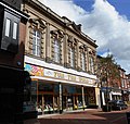 The second Town Hall of 1900, on the opposite side of High Street, now in use as a shop.