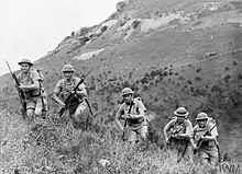 Canadian soldiers on exercise in Hong Kong prior to the Japanese invasion of the colony, 1941 Canadian soldiers training in the hills on Hong Kong Island.jpg