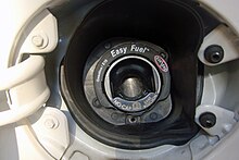 Typical warning placed in the fuel filler of U.S. vehicles regarding the capability of using up to E10 and warning against the use of blends between E20 and E85. E10 warning 475 DC.JPG