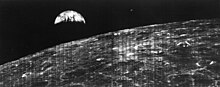 Earth taken from Lunar Orbiter 1 in 1966. Image as originally shown to the public displays extensive flaws and striping. First View of Earth from Moon.jpg