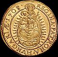 Ducat de aur bătut la monetăria din Baia Mare (1705); revers, central: Fecioara Maria, așezată pe un Tron Ceresc, încoronată ca Regină a Cerului și a Pământului, a îngerilor și a oamenilor, cu Pruncul Isus în brațe, poartă un sceptru în mâna stângă; Pruncul Isus ține în mâna dreaptă un globus cruciger; pe marginea monedei, circular, este gravat textul în latină: REGINA·PATRONA·HVNGARIÆ·1705·[3]