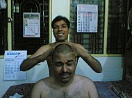 "Champie" (Indian Head Massage) in Mumbai, Maharashtra, India.