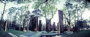 Multiple metal stelae during sunset