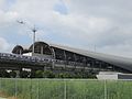 A commuter train leaving New Taipei Industrial Park