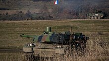 French Leclerc tank and Romanian Piranha V at the Cincu military camp Premiers tirs des chars Leclerc lors de l'exercice EAGLE ZORI.jpg