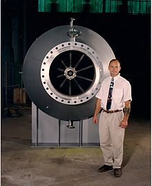 The largest detonation flame arrester ever built at the time, weighing 10 tons, for 30 inch pipe. Pictured with Dwight Brooker Rohm & Hass 36 inch detonation flame arrester & Brooker.jpg